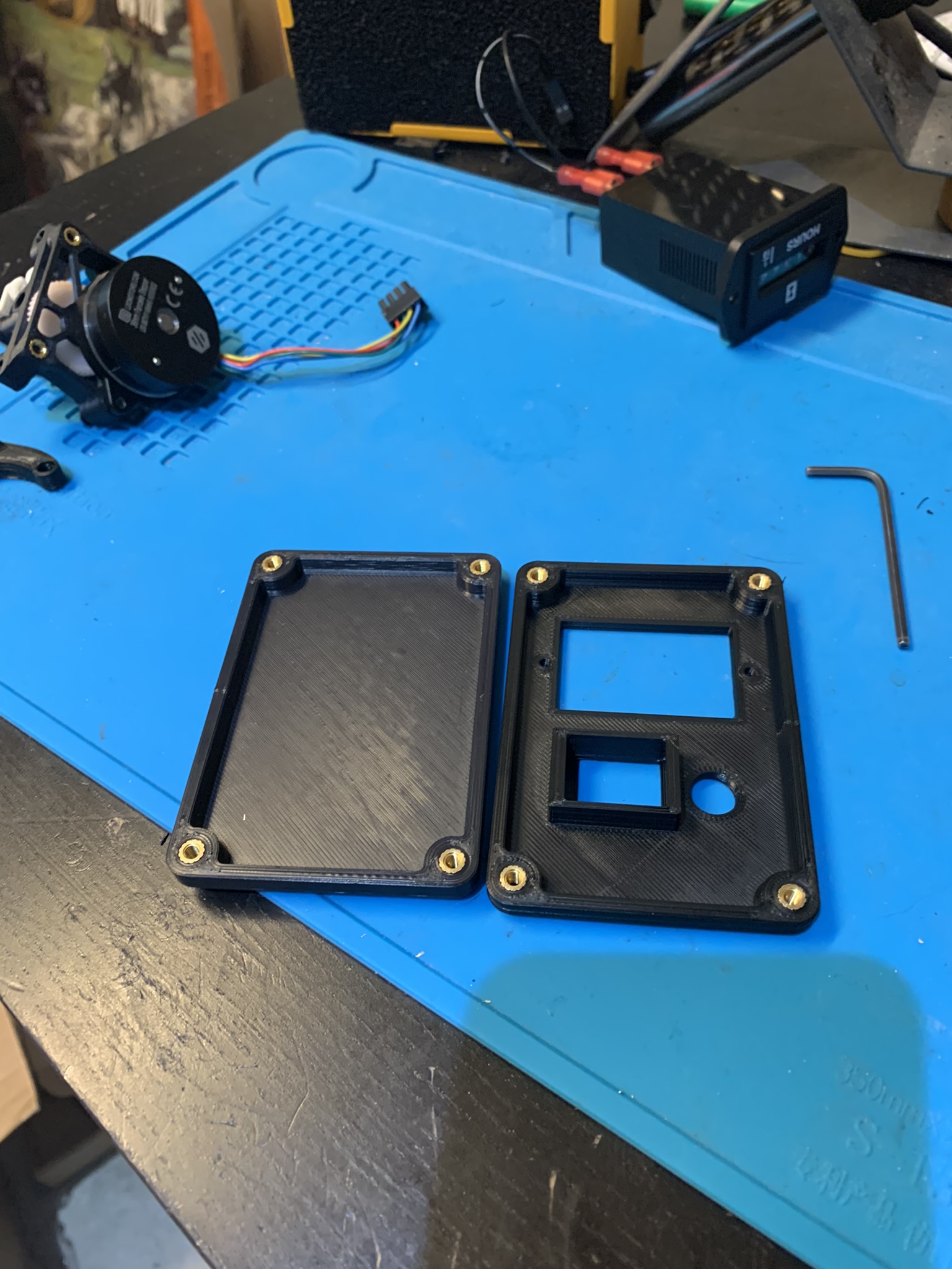 Heatset inserts installed into electronics blanking plates