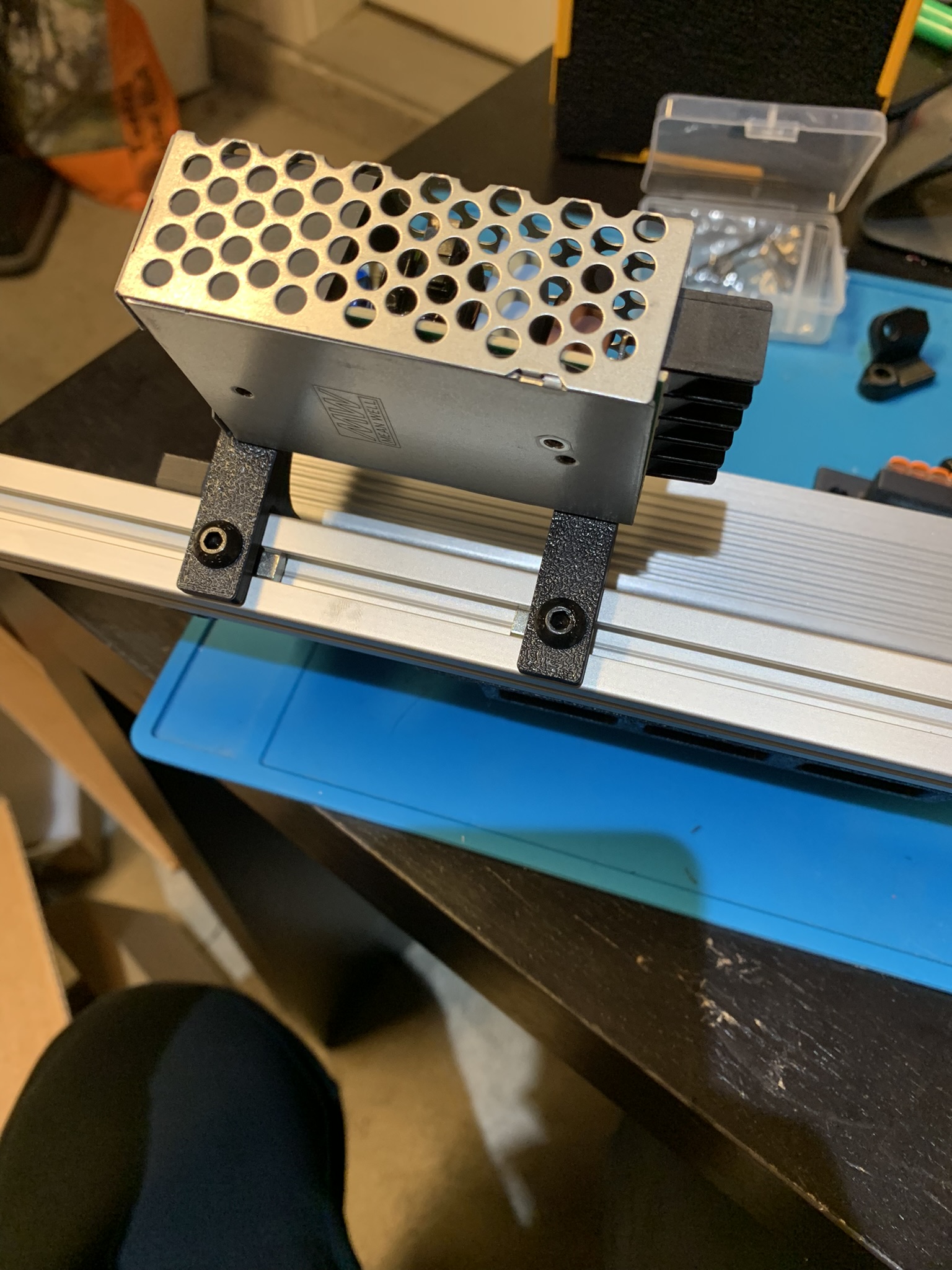 Mounts attached to the extrusion at the side